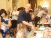 Fr. Nigel serving cake
