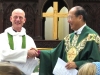 Archbishop Paul presenting Fr. Nigel to the congregation